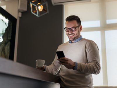 Man surfing the Internet using smart phone